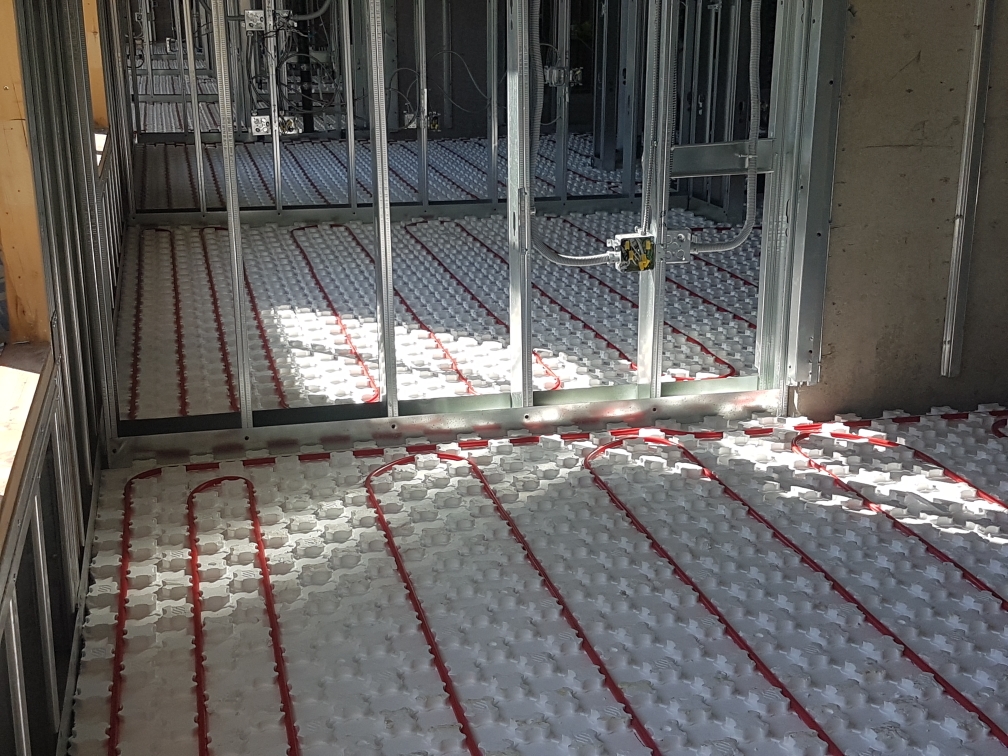 Piping and Heat-Sheet Panels in a Suite