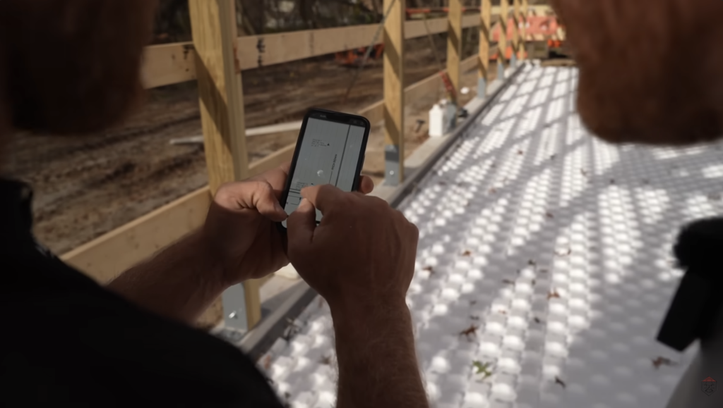 Following the engineered plan ensures precise PEX spacing for consistent heat and reliable radiant performance.